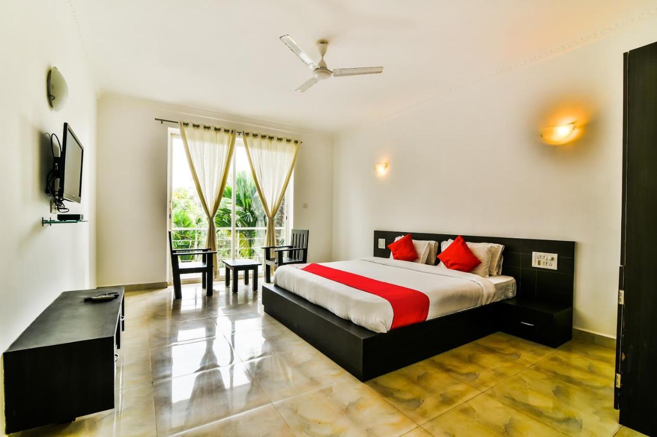 Capital O La Conceicao Grande Hotel Morjim Luaran gambar